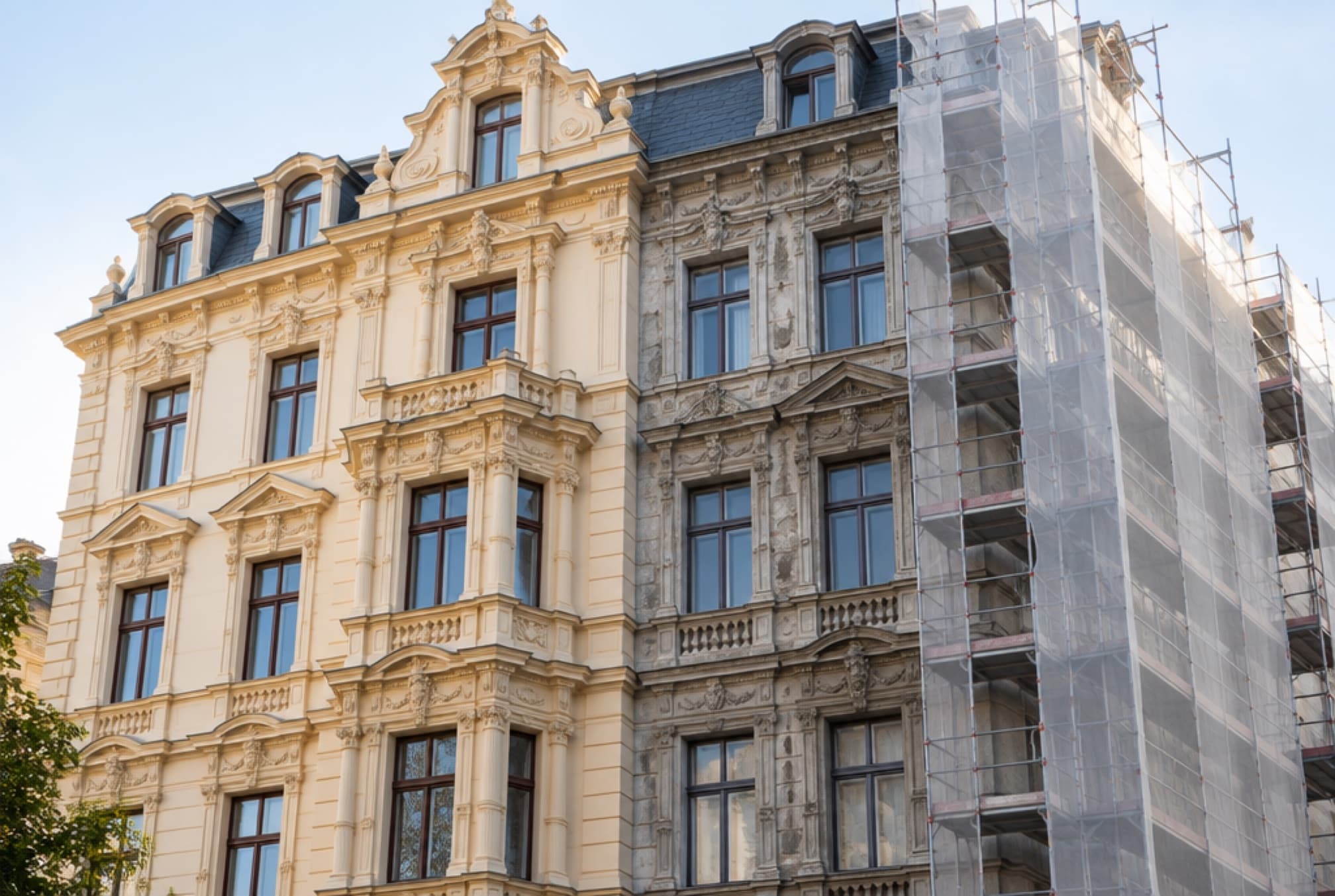 Period facade in scaffolding during renovation